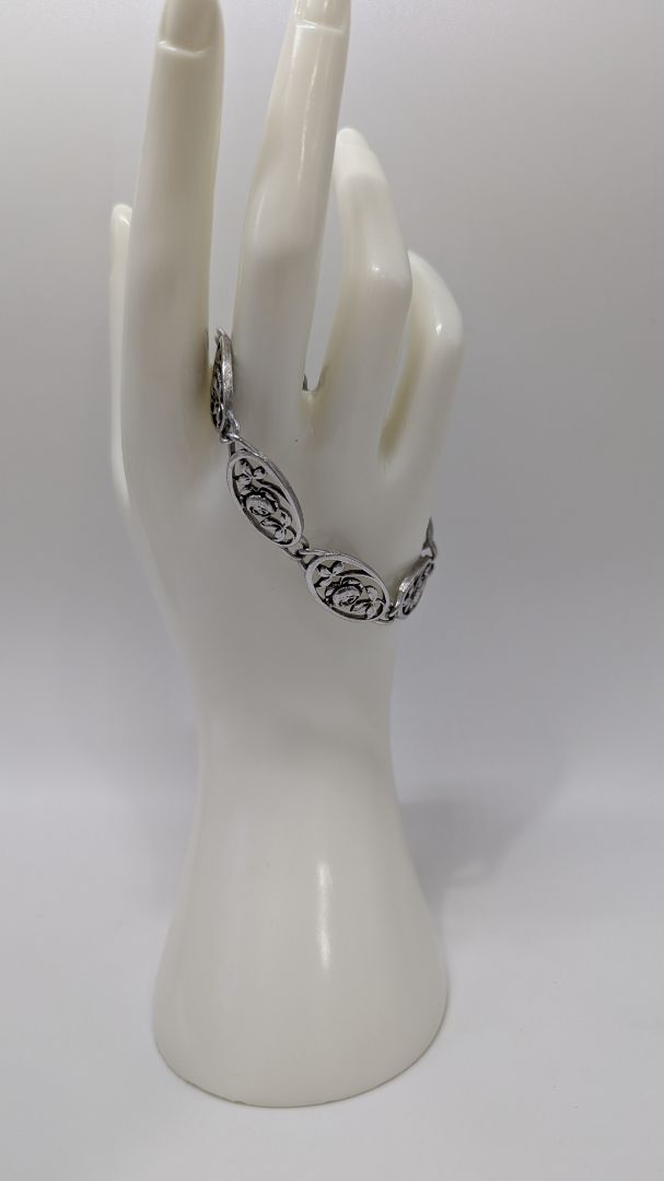 Silver Rose Cutout Bracelet