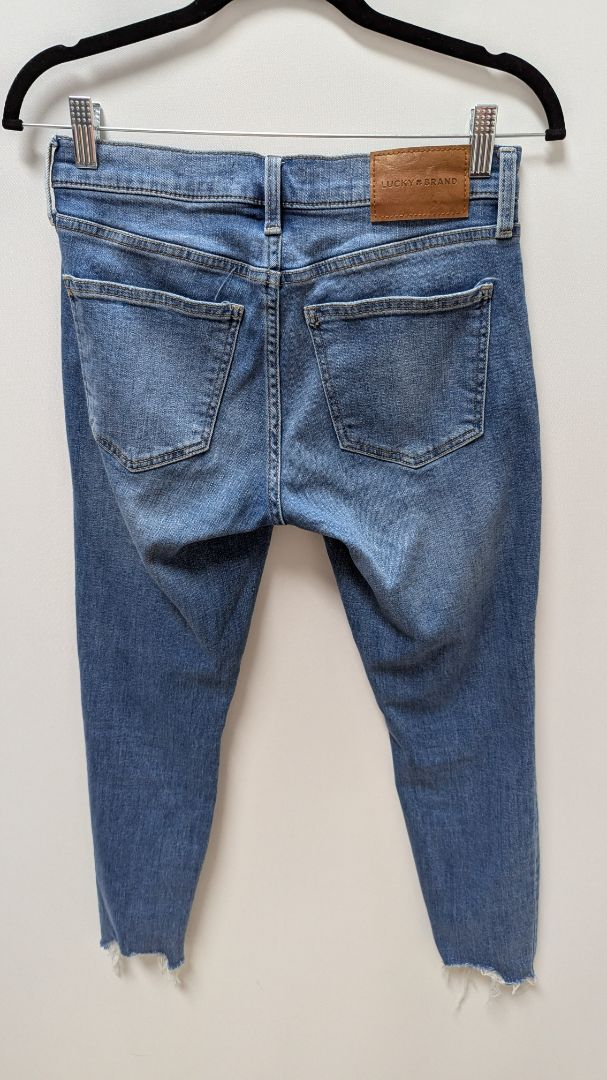 Lucky Brand Light Wash "Ava" Mid-Rise Distressed Skinny Jean