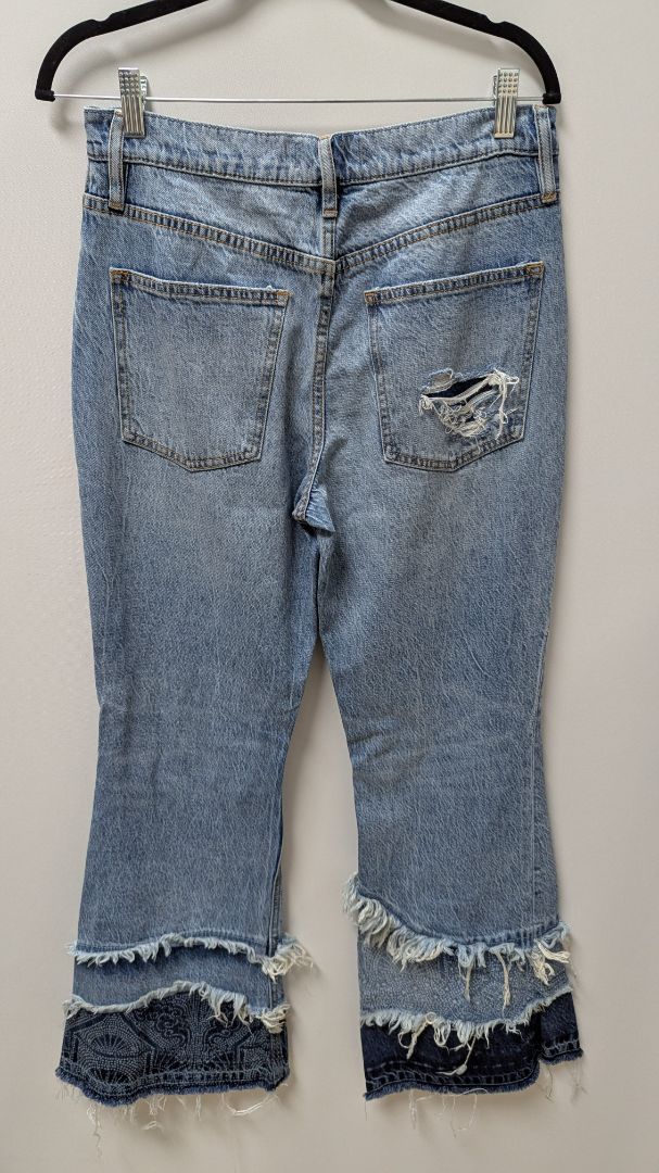 We The Free Light Wash Distressed Flared Jeans