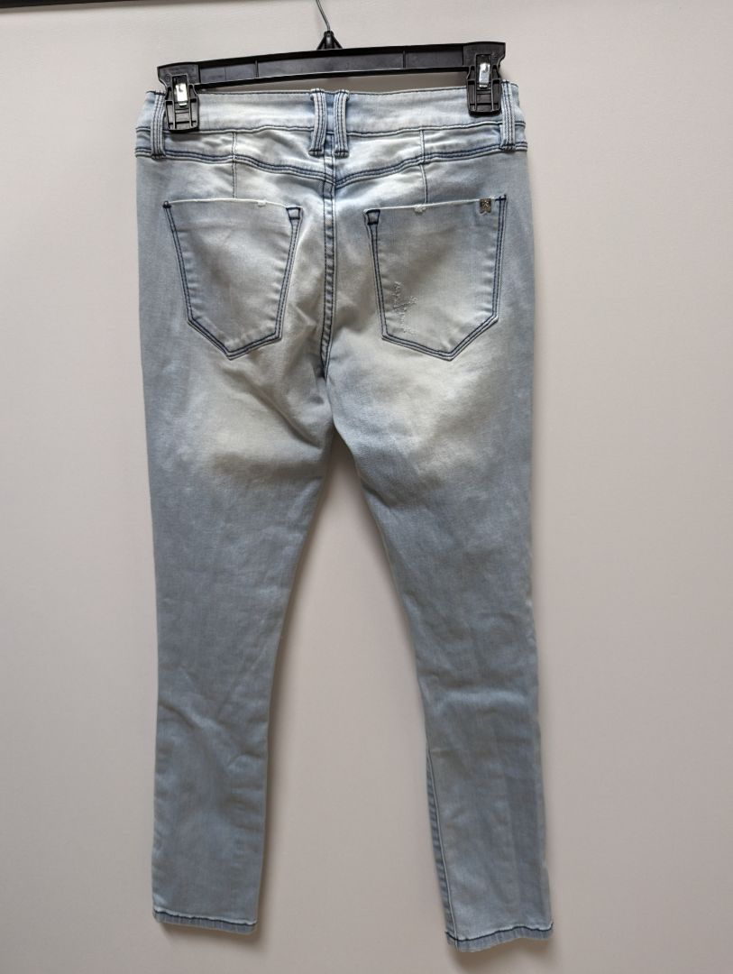 Bebe Light Wash Distressed Skinny Jeans