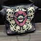 Black/Ivory/Purple Vintage Embroidered Rolling Travel Bag