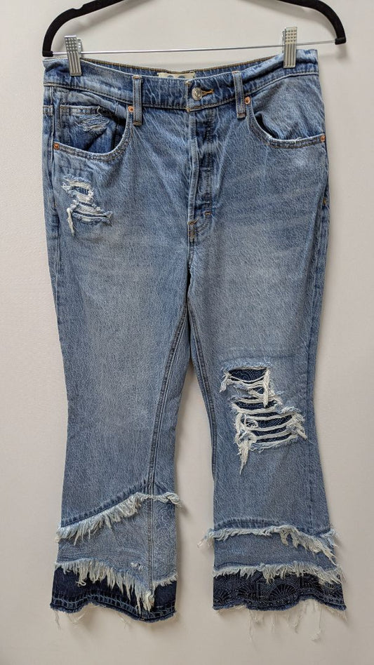 We The Free Light Wash Distressed Flared Jeans
