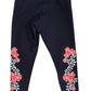 Torrid Black Capri Leggings with Floral Leg Embellishment